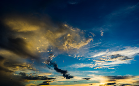Dramatic sky at sunset with red, yellow and orange colors.