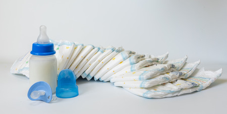Two stacks of diapers on white backgroundの写真素材