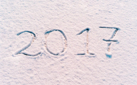 2017 new year written in flour on the wooden background