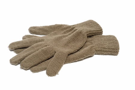brown fabric glove on bright backgroundの写真素材