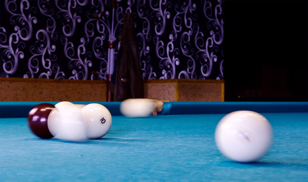 Action Shot Billiards Table Pool Cue and Balls.