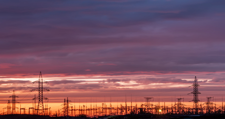 silhouette substation with sunset background,substation on sunset timeの写真素材