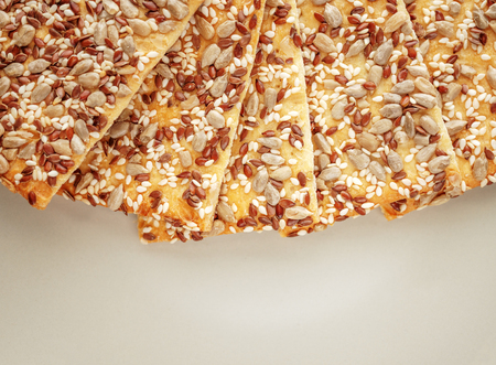 Vegetarian crispy biscuits with sunflower, flax seeds and sesame seeds.の写真素材