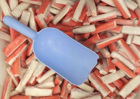 Frozen crab sticks surimi background. Sea food.の写真素材