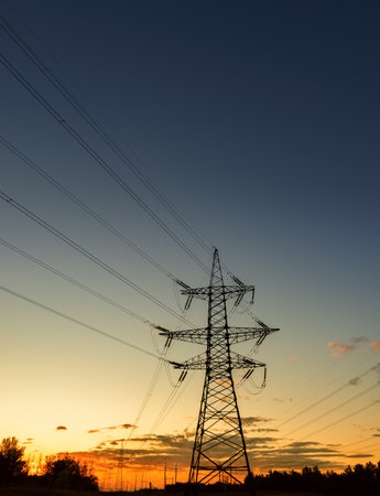 High voltage power tower beautiful scenery at dusk.