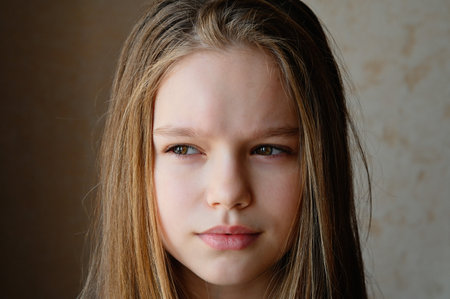 The girl looks into the distance. A romantic image. Portrait of a beautiful woman with long hair...