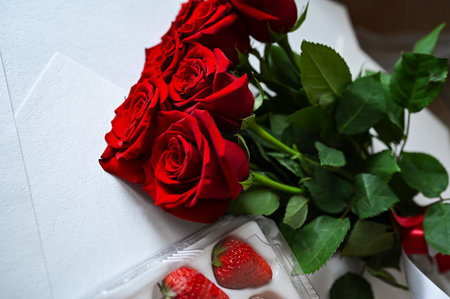 Red roses, flowers gift. A text frame made of wedding flowers. view from above. Flat layout template. post card design.の写真素材