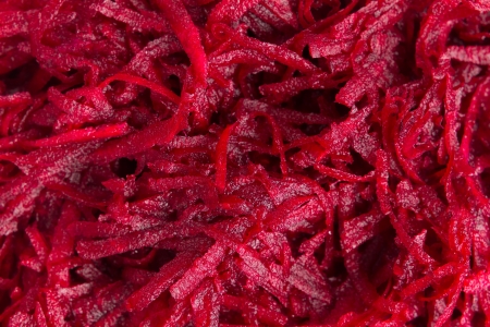 Raw grated beet background