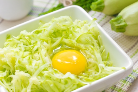 Grated zucchini with eggの写真素材