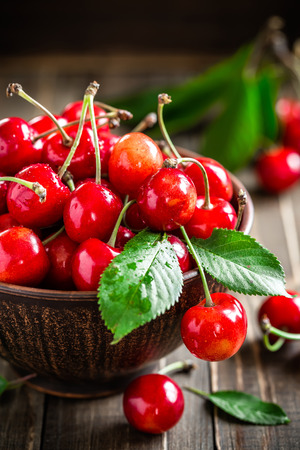 Sweet cherry  on wooden backgroundの写真素材