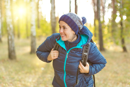 woman hiking in a forestの写真素材