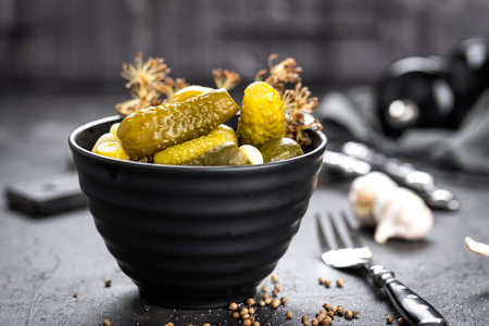 Pickled cucumbers, small marinated pickles, gherkinsの写真素材