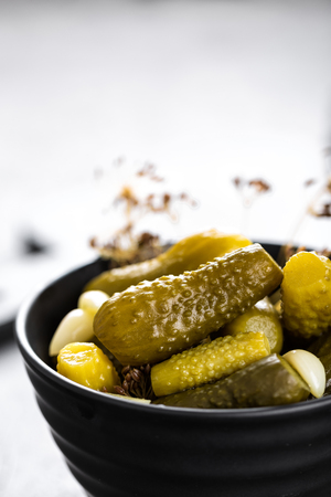 Pickled cucumbers, small marinated pickles, gherkinsの写真素材