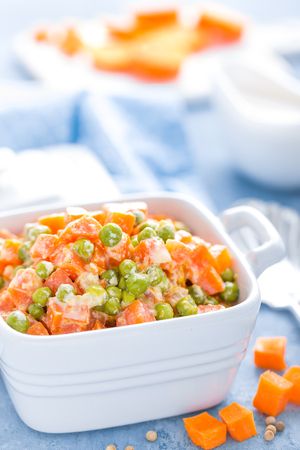Green peas stewed with carrots in creamy milk white sauce, vegetable stewの写真素材