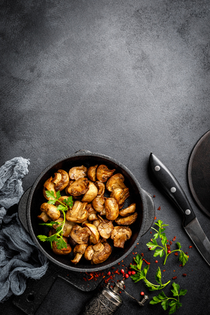 Fried mushrooms, champignons in panの写真素材
