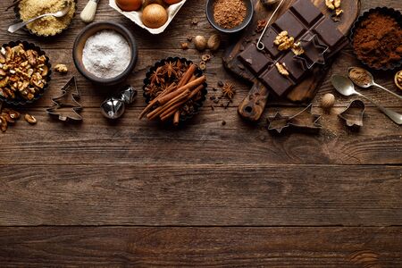 Christmas or new year culinary rustic wooden background with food ingredients for cooking festive...