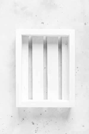 Empty wooden crate box on white background, top view, space for textの写真素材