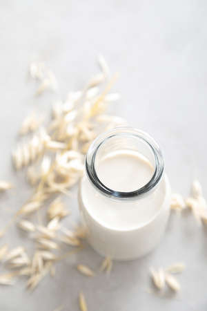 Oat milk. Delicious and healthy vegetarian alternative milk drink. Non-dairy milk