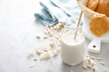 Oat milk. Delicious and healthy vegetarian alternative milk drink. Non-dairy milkの写真素材