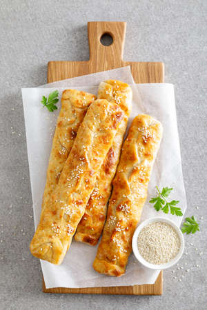 Freshly baked homemade savory puff pastries patties, rollini