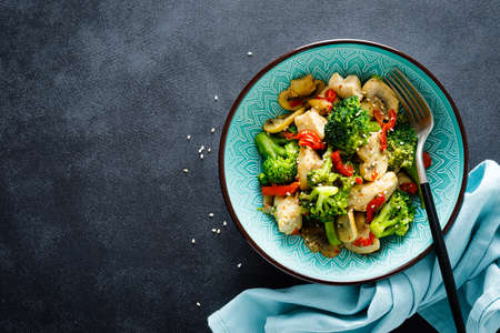 Chicken stir fry with vegetables and mushrooms. Top viewの写真素材