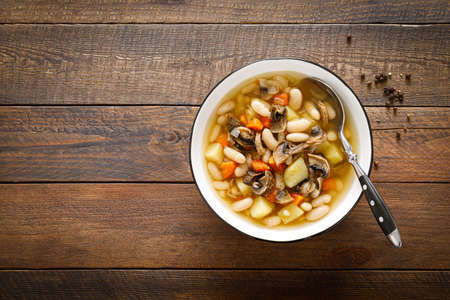 Mushroom soup with kidney bean, potato and carrot.の写真素材