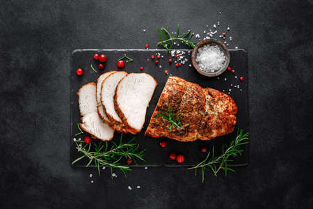 Christmas turkey ham roasted for festive dinner on black background. Top viewの写真素材