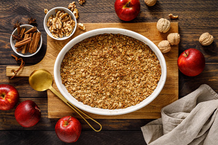 Apple crumble with oatmeal, walnuts and cinnamon. Top viewの写真素材