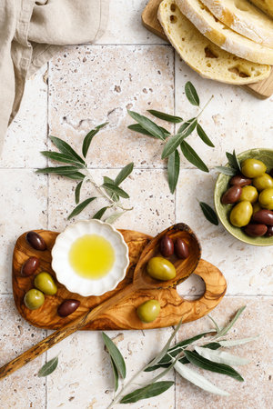 Olives, olive oil and ciabatta, top viewの写真素材