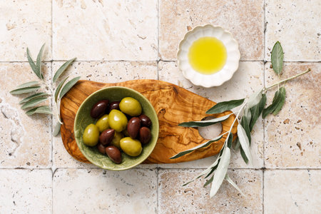 Olives and olive oil, top viewの写真素材