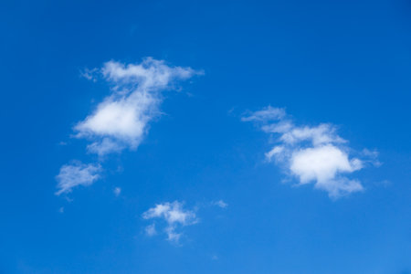 Sky clouds. Blue sky and white clouds backgroundの写真素材