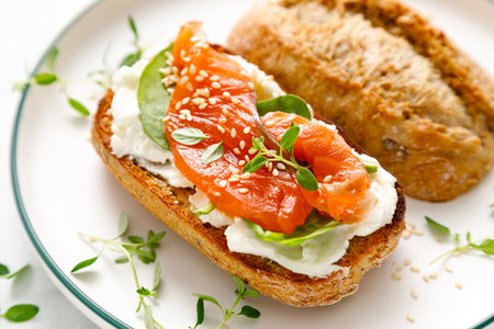 Salmon salted sandwich with spinach and cream cheeseの写真素材