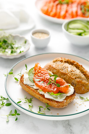 Salmon salted sandwich with spinach and cream cheeseの写真素材