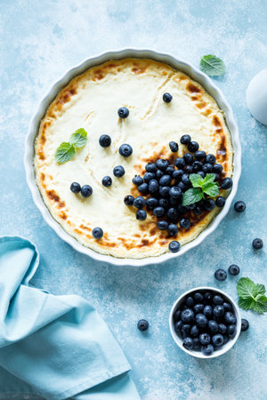 Cottage cheese cheesecake with fresh blueberry, top down viewの写真素材