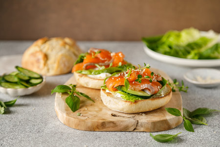 Salmon sandwiches with cream cheese, fresh romaine lettuce and cucumberの写真素材