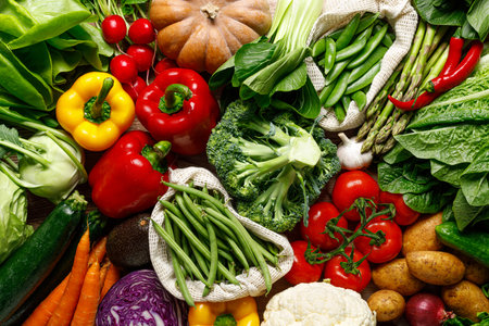 Vegetables background. Various vegetables on kitchen table. Clean eating, healthy food concept, flat...