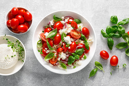 Salad of tomato, ricotta cheese and basil, top viewの写真素材