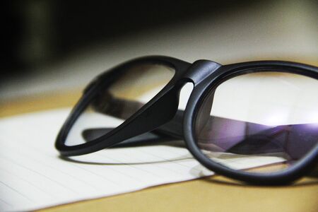 black eye glasses isolated on white backgroundの写真素材