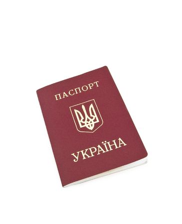 The passport for travel abroad of the citizen Ukraine on a white backgroundの写真素材