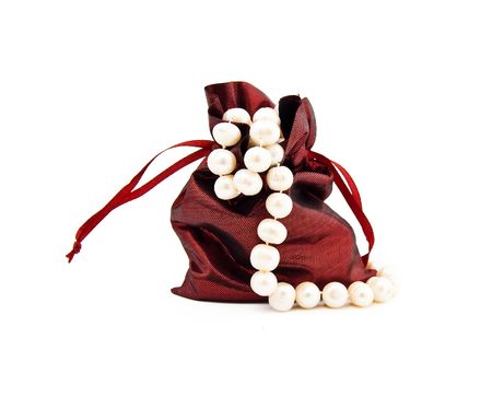 Bag for a gift with a pearl necklaceの写真素材
