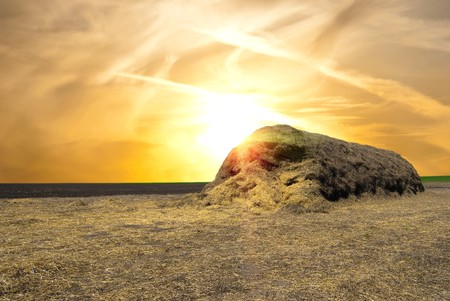 Haystack against the evening skyの写真素材