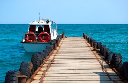 White walking yacht on the water at the berthの写真素材
