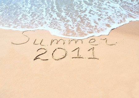  Inscription on wet sand の写真素材