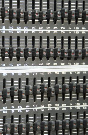 Close up of a sound recording and mixing console