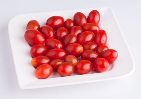 A plate of cherry tomatoesの写真素材