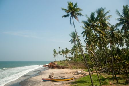 Fishing boats on a small Asian beachの写真素材
