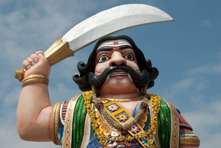 A statue of the mythological Hindu demon Mahishasura in Chamundi Hills, Mysore, Indiaの写真素材