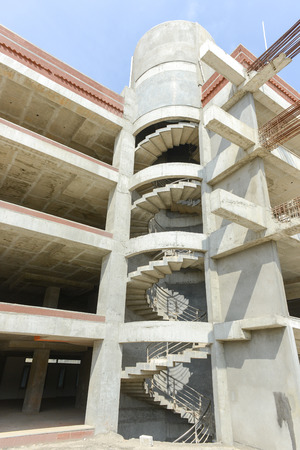 A construction site in Asia showing a building and stairs under constructionのeditorial素材