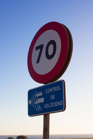 Isolated traffic sign. Seventy miles per hour speed limit sign round red. Roadの写真素材