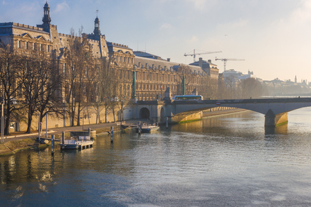 Bridge in Paris France. Senna river, sunlight, winter morningの写真素材
